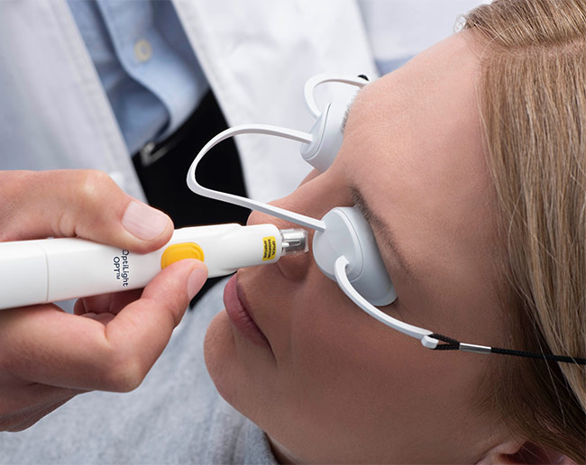 Woman getting an dry eye treatment in Allendale, MI