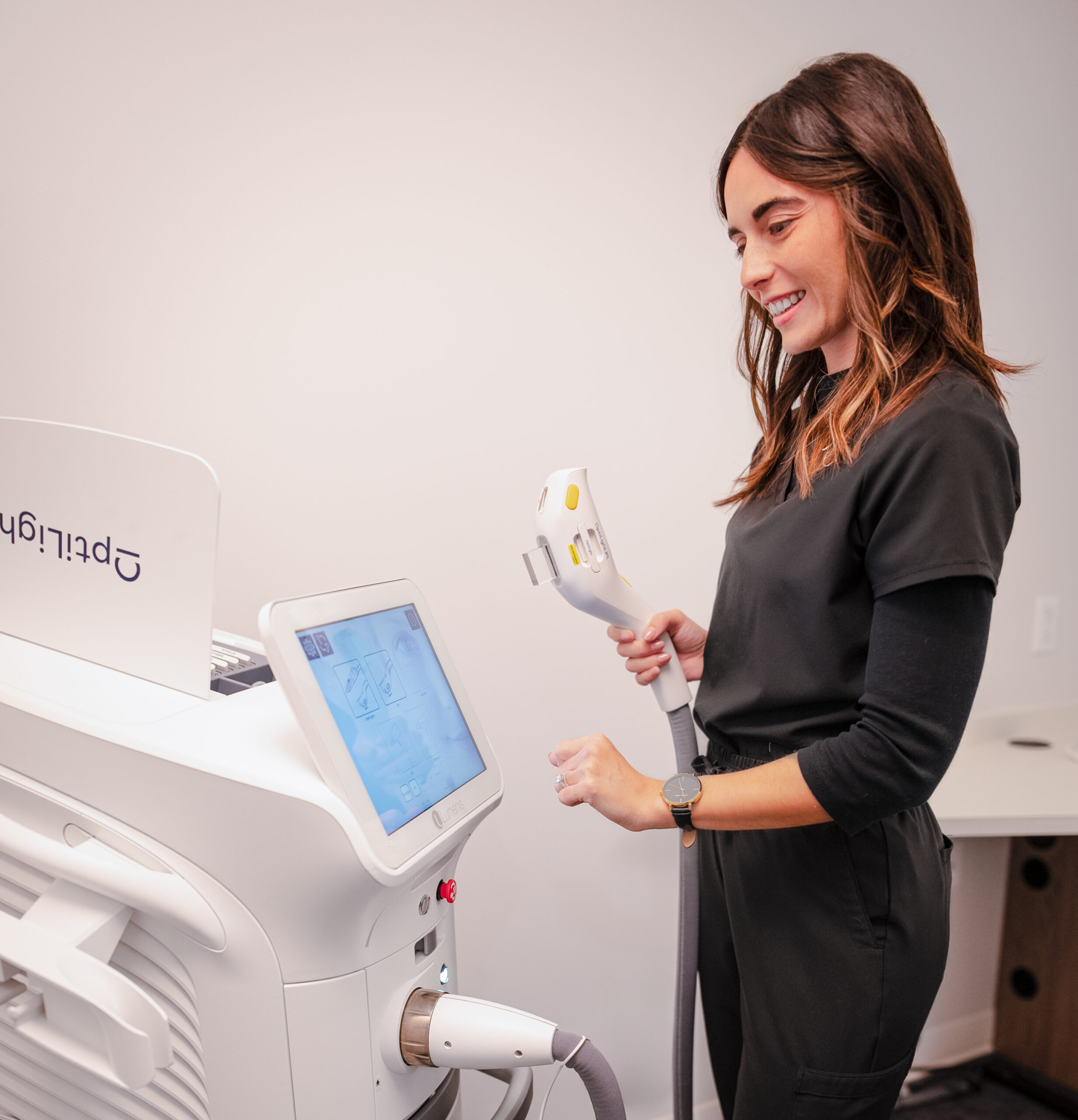 Dr. Amanda Bancroft prepares the OptiLight IPL machine to perform a dry eye treatment at Rejuvenation Dry Eye Center.