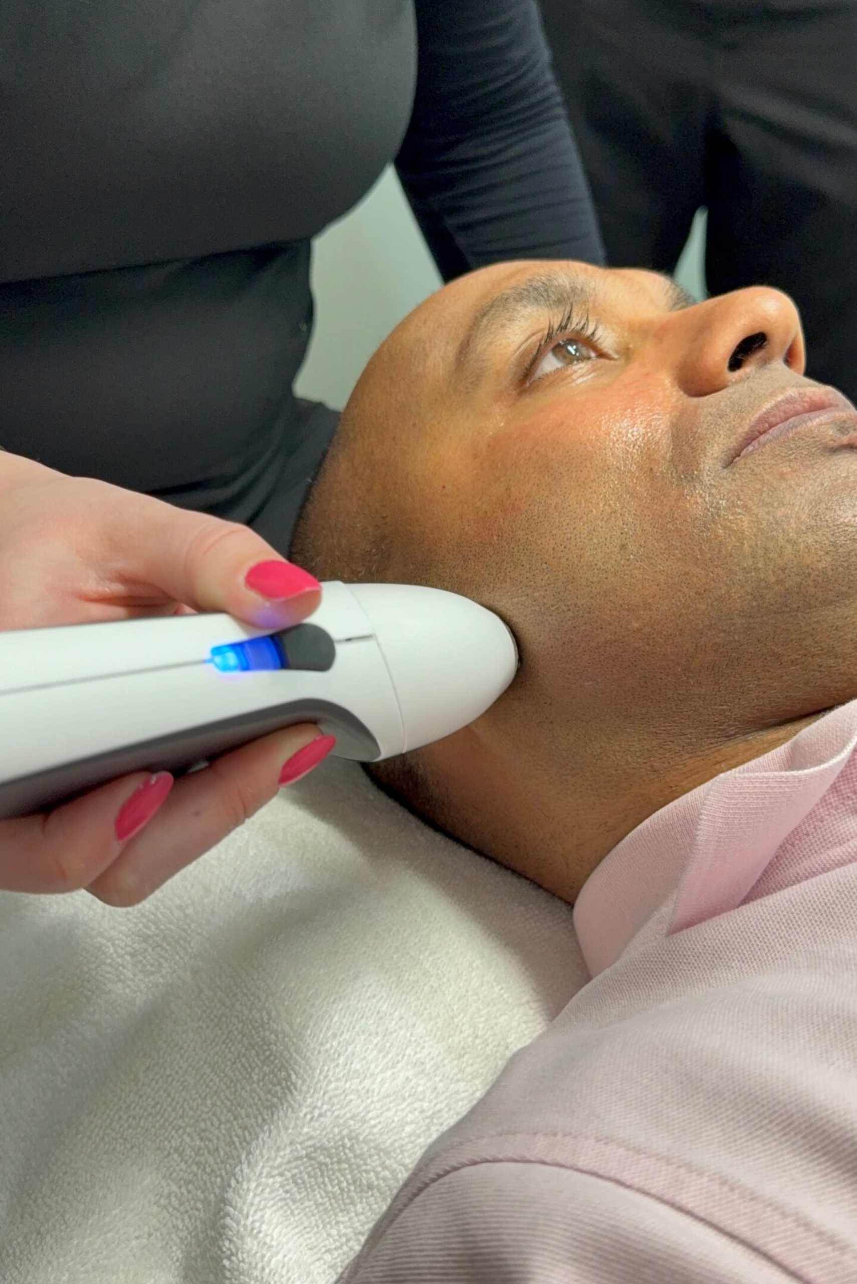 A specialist uses the OptiLight IPL system to treat a patient for dry eye inflammation at Rejuvenation Dry Eye Center.