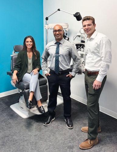 The dedicated care team at Rejuvenation Dry Eye Center posing together in their modern clinic.